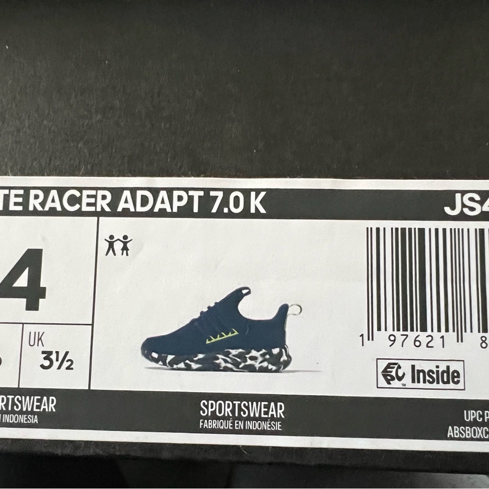 Women’s size 5a/ Nike Kids' Navy Racer Adapt 7.0 Sneakers